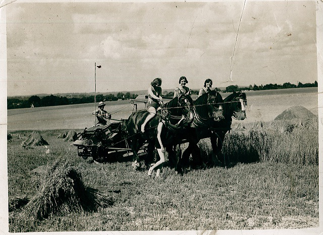 During WW2 a team of amazing land girls helped James Gray (driving the tractor) to keep the farm running.